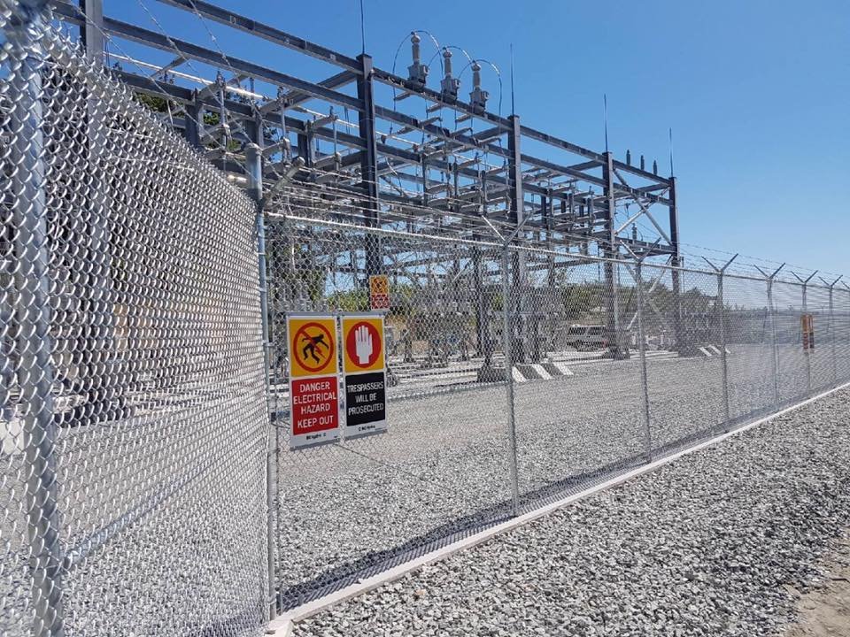 Chain link fencing is a common, cost-effective, and durable option for government facilities, providing site security and defining boundaries