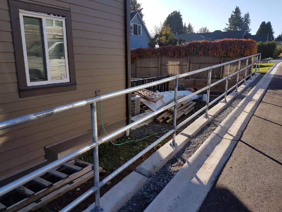 Custom barrier gates, security gates, driveway gates, and industrial metal gates in the Fraser Valley. High-strength steel fabrication and professional installation