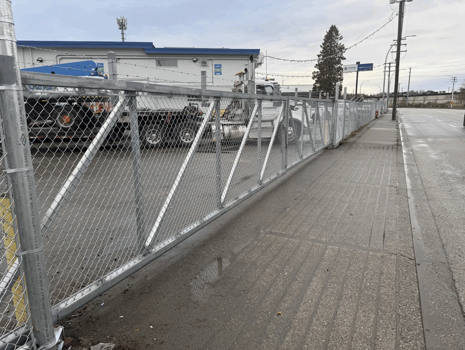 LS Fencing & Metal designed and installed a custom double cantilever gate for Cooper Rentals in Langley BC. Premium industrial gate solutions across Fraser Valley. LS Fencing & Metal designed and installed a custom double cantilever gate for Cooper Rentals in Langley BC. Premium industrial gate solutions across Fraser Valley.