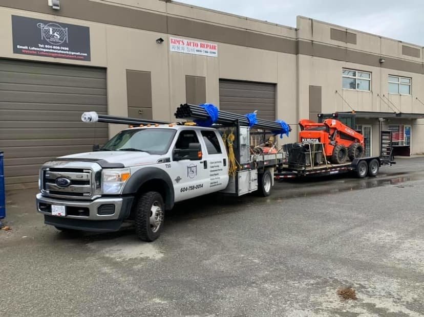LS Fencing and metal work fencing contractor Fraser Valley Skid steer grading soil on residential project. snow removal with skid steer in Chilliwack LS Fencing and metal work fencing contractor Fraser Valley Skid steer grading soil on residential project. snow removal with skid steer in Chilliwack