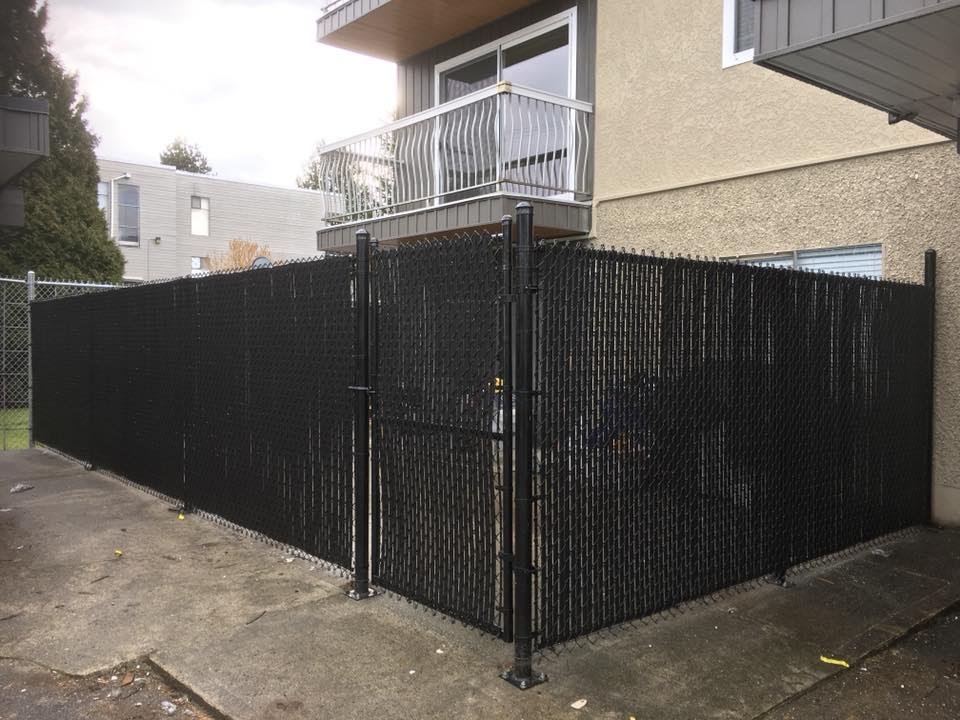 Tall galvanized chain link fence for secure area for multi family complex chiiliwack 